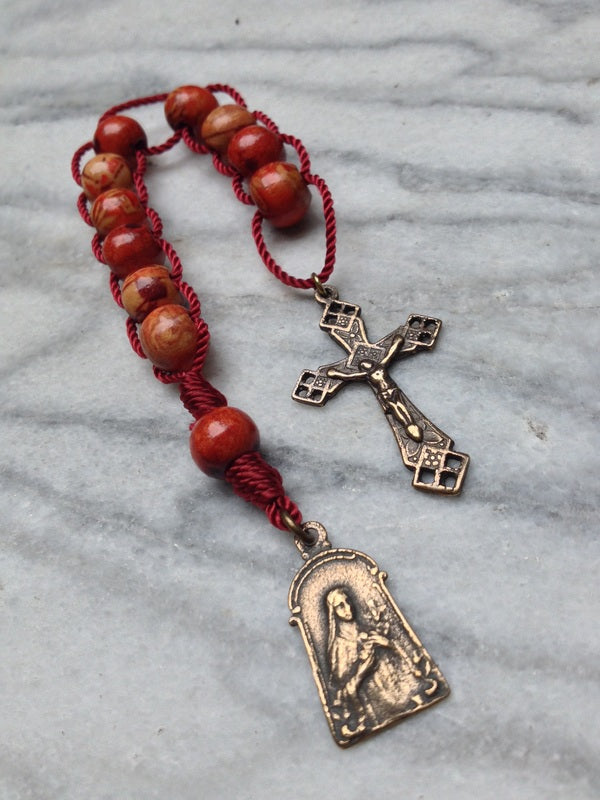 Sacrifice Bead Tenner - Redwood