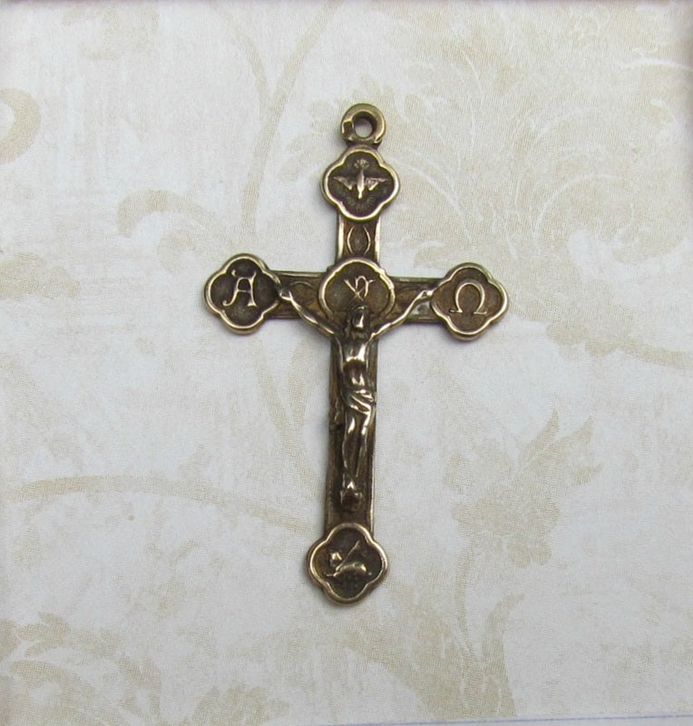 Crucifix, Alpha Omega