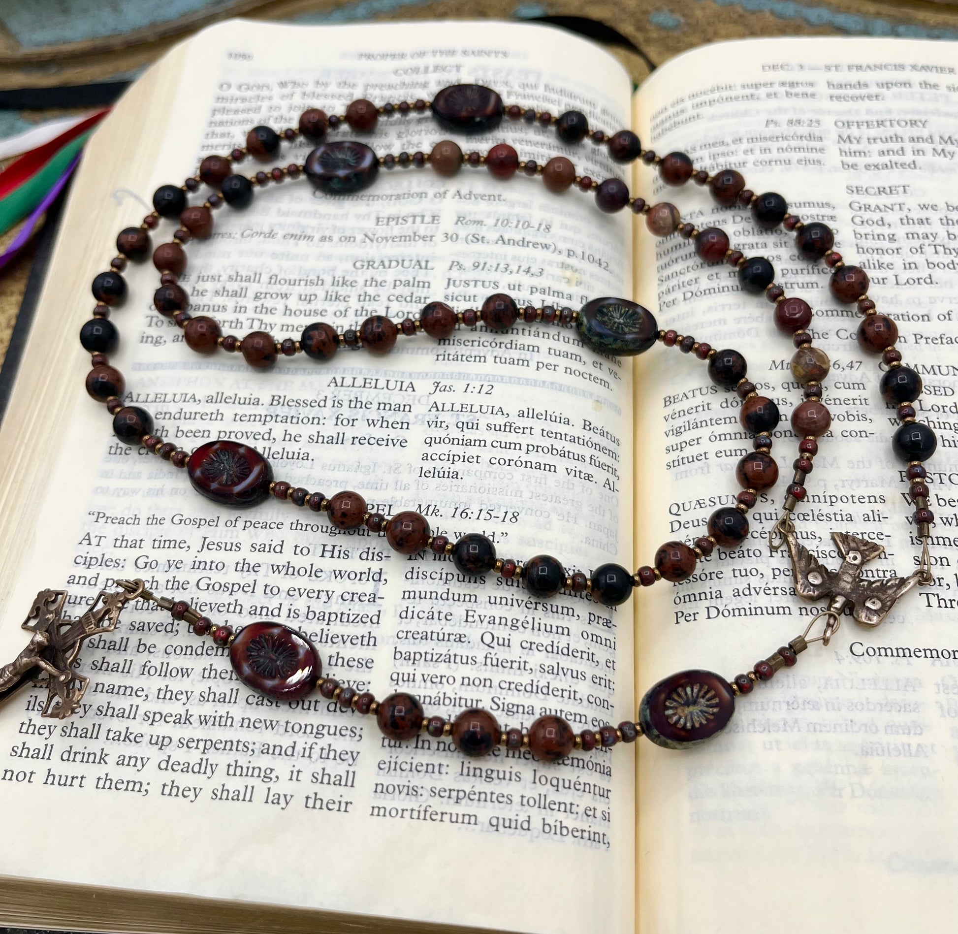 Close up of natural brecciated jasper gemstone beads showing subtle variations on handmade Catholic rosary