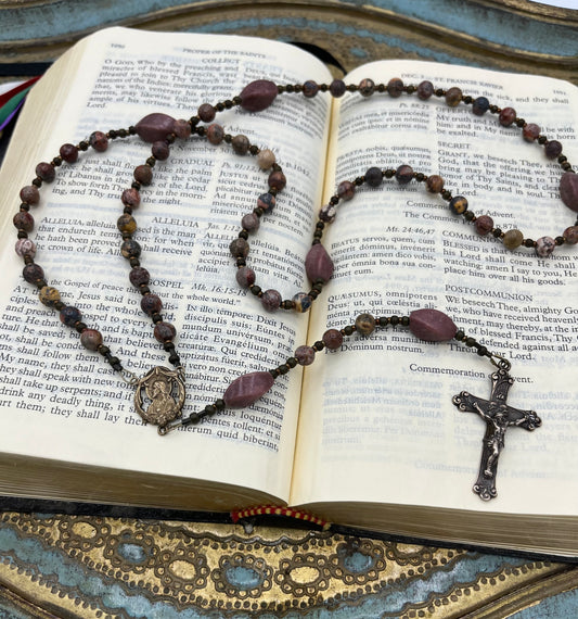 Handmade Catholic rosary with Leopardskin Jasper gemstone beads and carved Rhodonite Our Father beads with bronze cruci